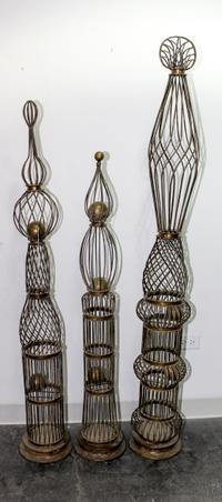 A Set of Three Topiary Forms Height of tallest 64 1/2 inches.