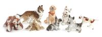 Eight Porcelain Dogs Width of widest 6 1/2 inches. — LATE 20TH CENTURY