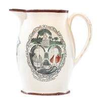 A Liverpool Transfer-Printed Creamware 'Memory of George Washington and the Proscribed Patriots of America' Pitcher with Polychrome Embellishment