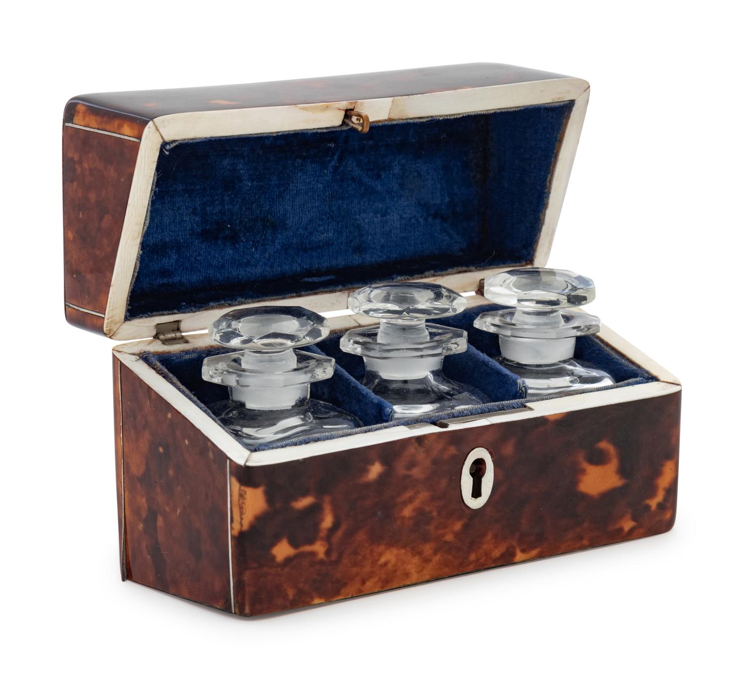 An English Tortoise Shell Veneered Scent Bottle Caddy