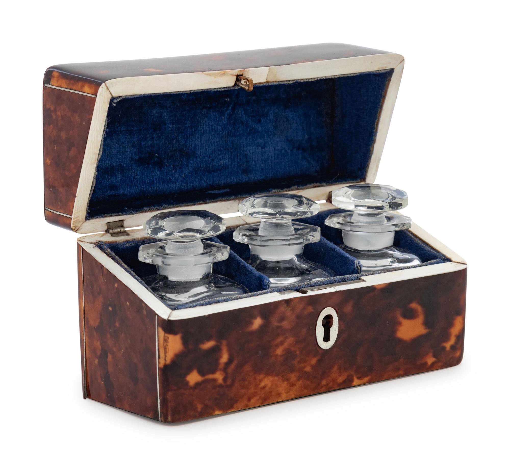 An English Tortoise Shell Veneered Scent Bottle Caddy