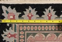 An Indo-Kashan Wool Rug