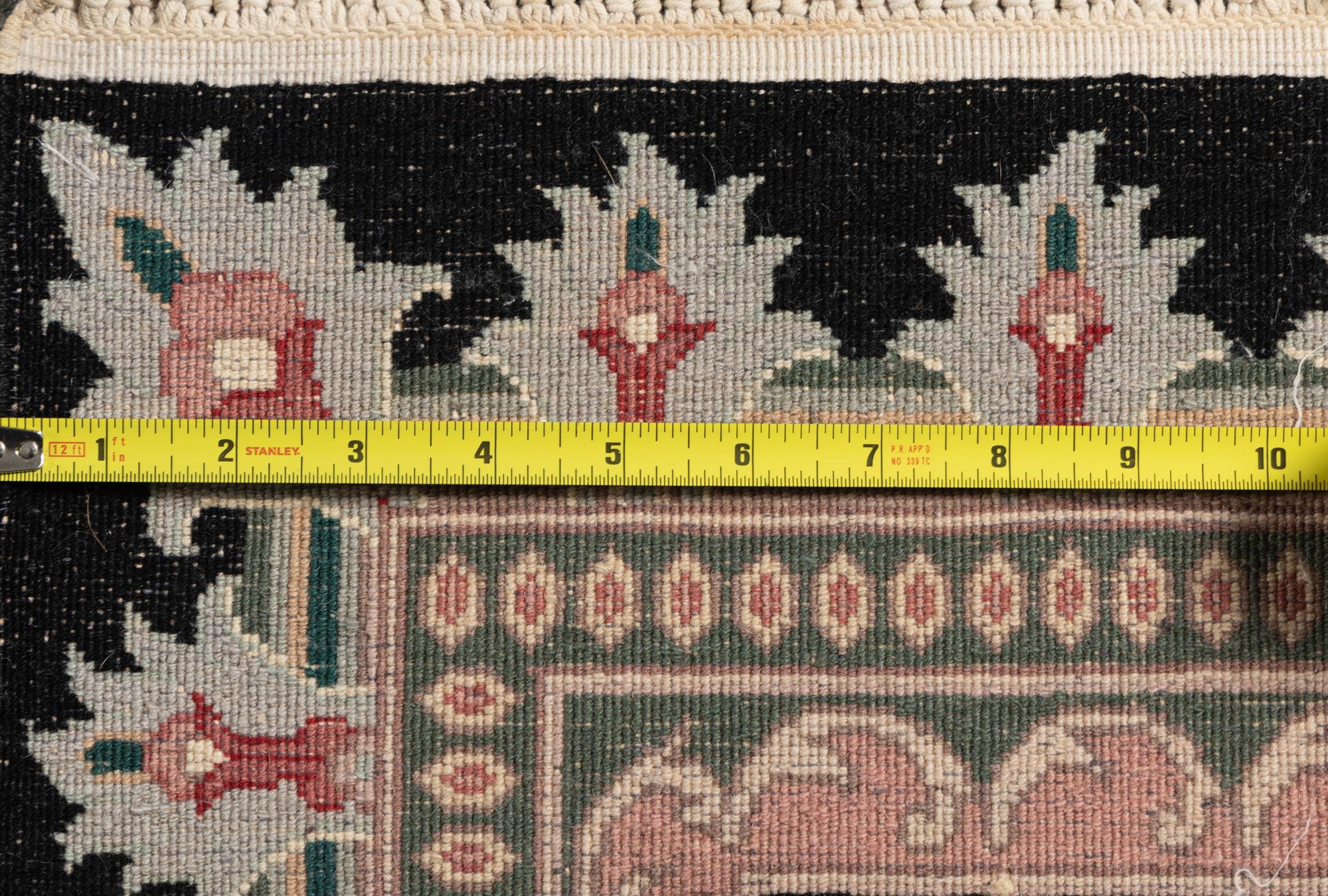 An Indo-Kashan Wool Rug