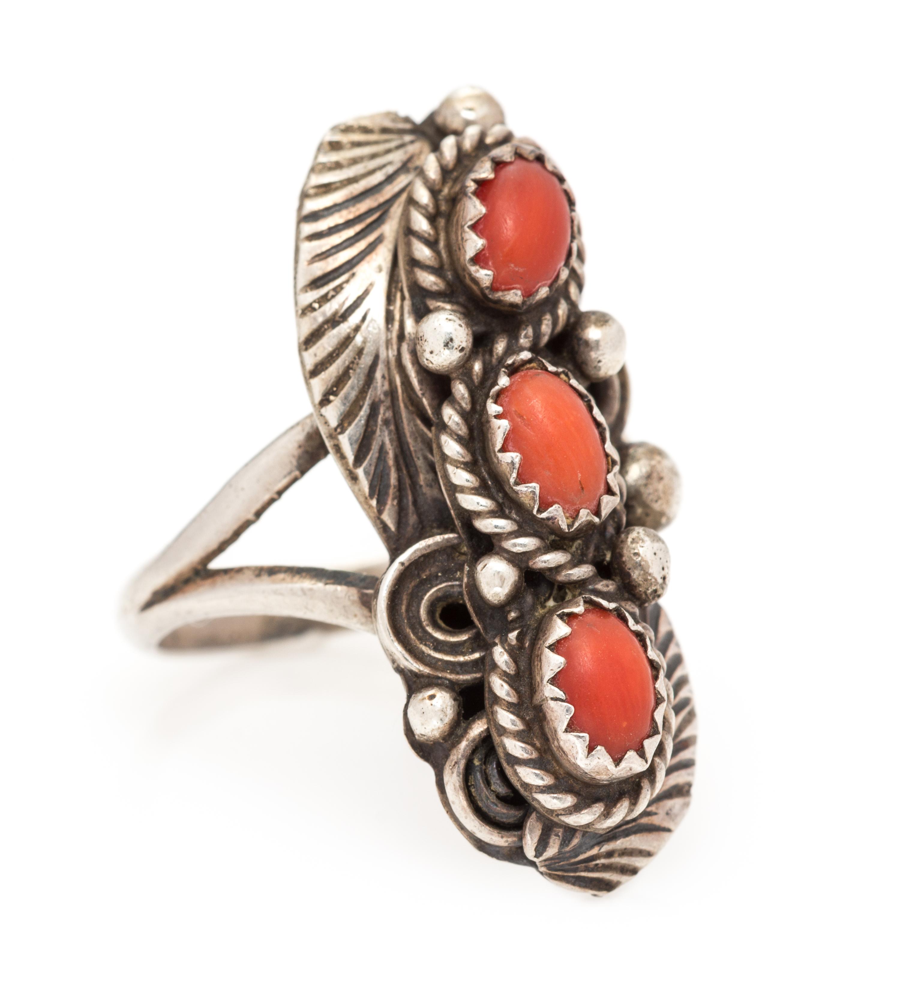 A Sterling Silver and Coral Ring, Justin Morris, Navajo, 4.40 dwts.