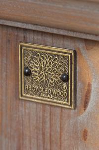 A Recycled Wood Display Cabinet with Glass-Front Drawers