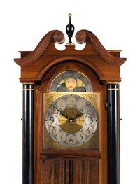 A Colonial Manufacturing Co. Mahogany Tall Case Clock