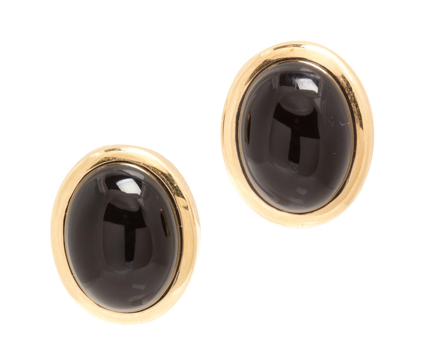 A Pair of 18 Karat Yellow Gold and Onyx Earclips, Tiffany & Co., 11.60 dwts.