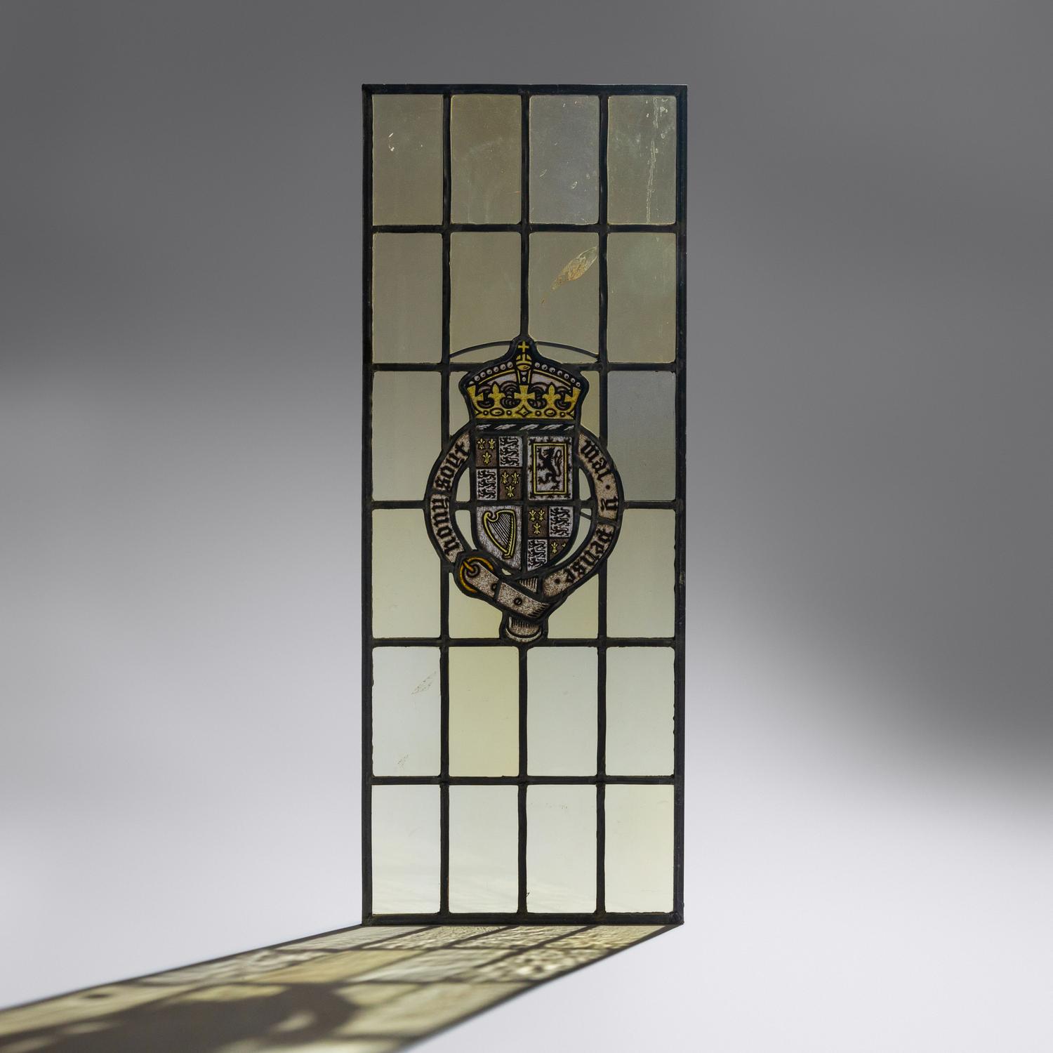 Window depicting a painted coat of arms