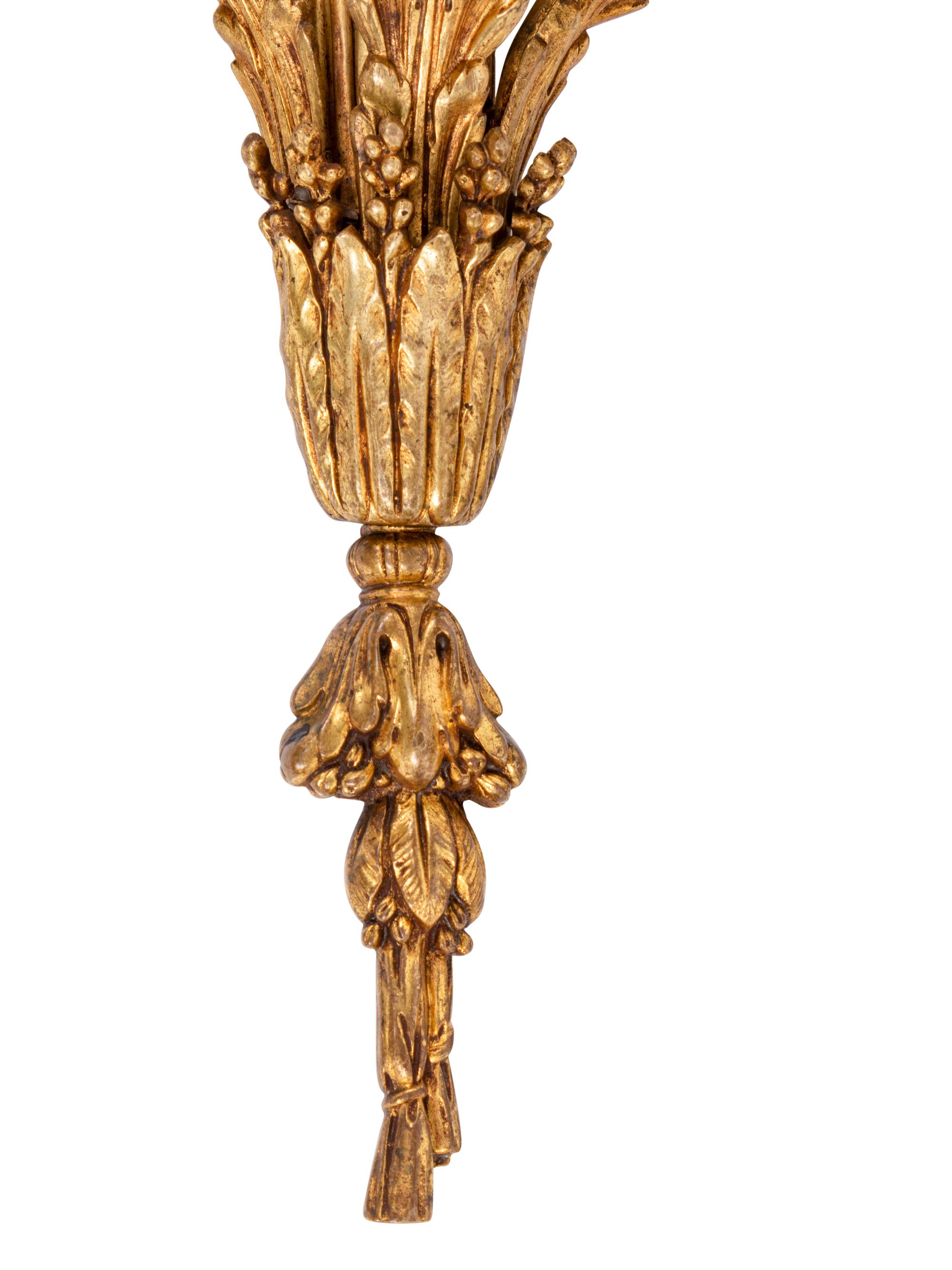 A Pair of Louis XVI Style Gilt Bronze Three-Light Sconces
