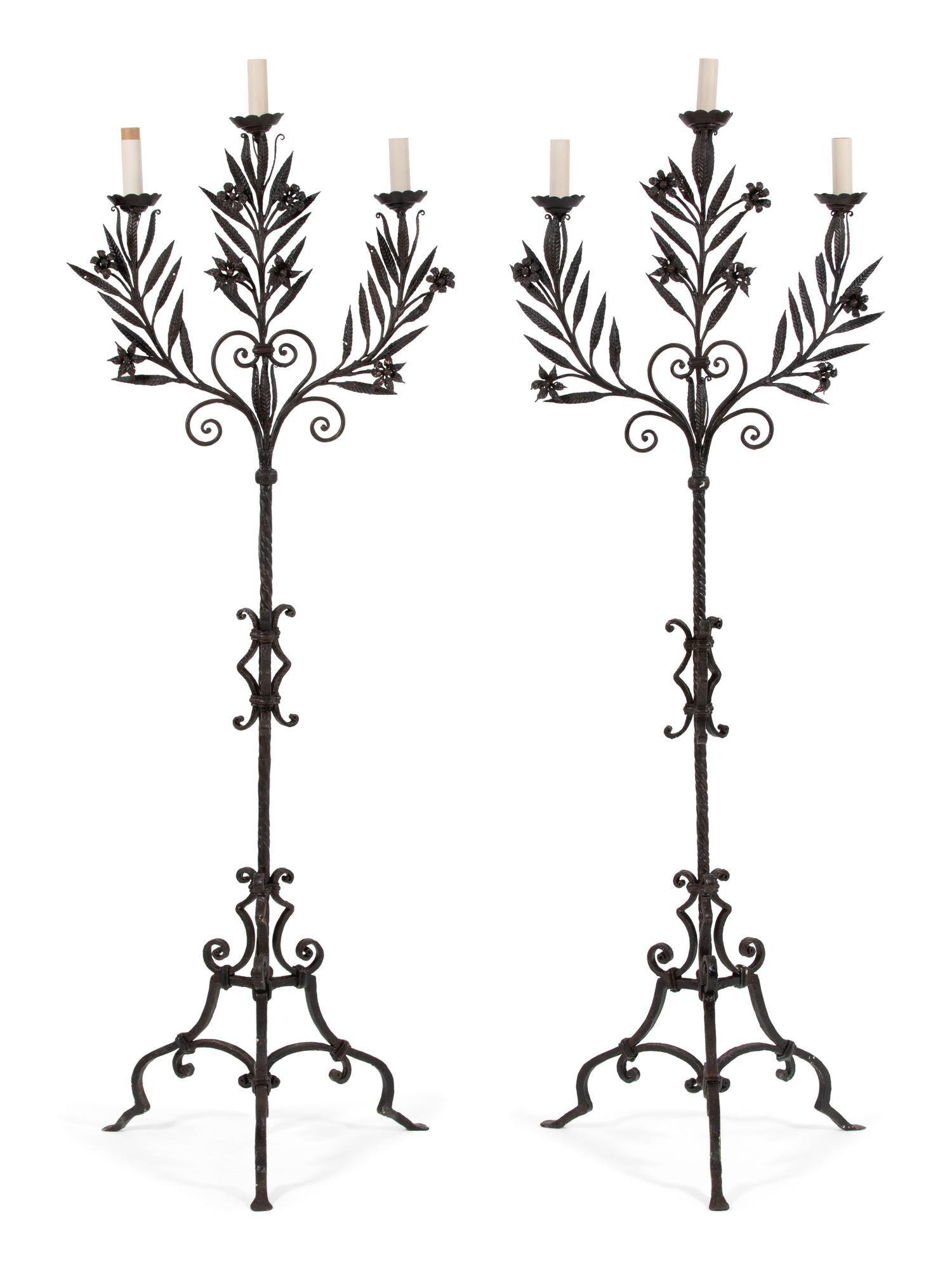A Pair of Mizner Style Three-Light Wrought Iron Torcheres — FIRST QUARTER 20TH CENTURY