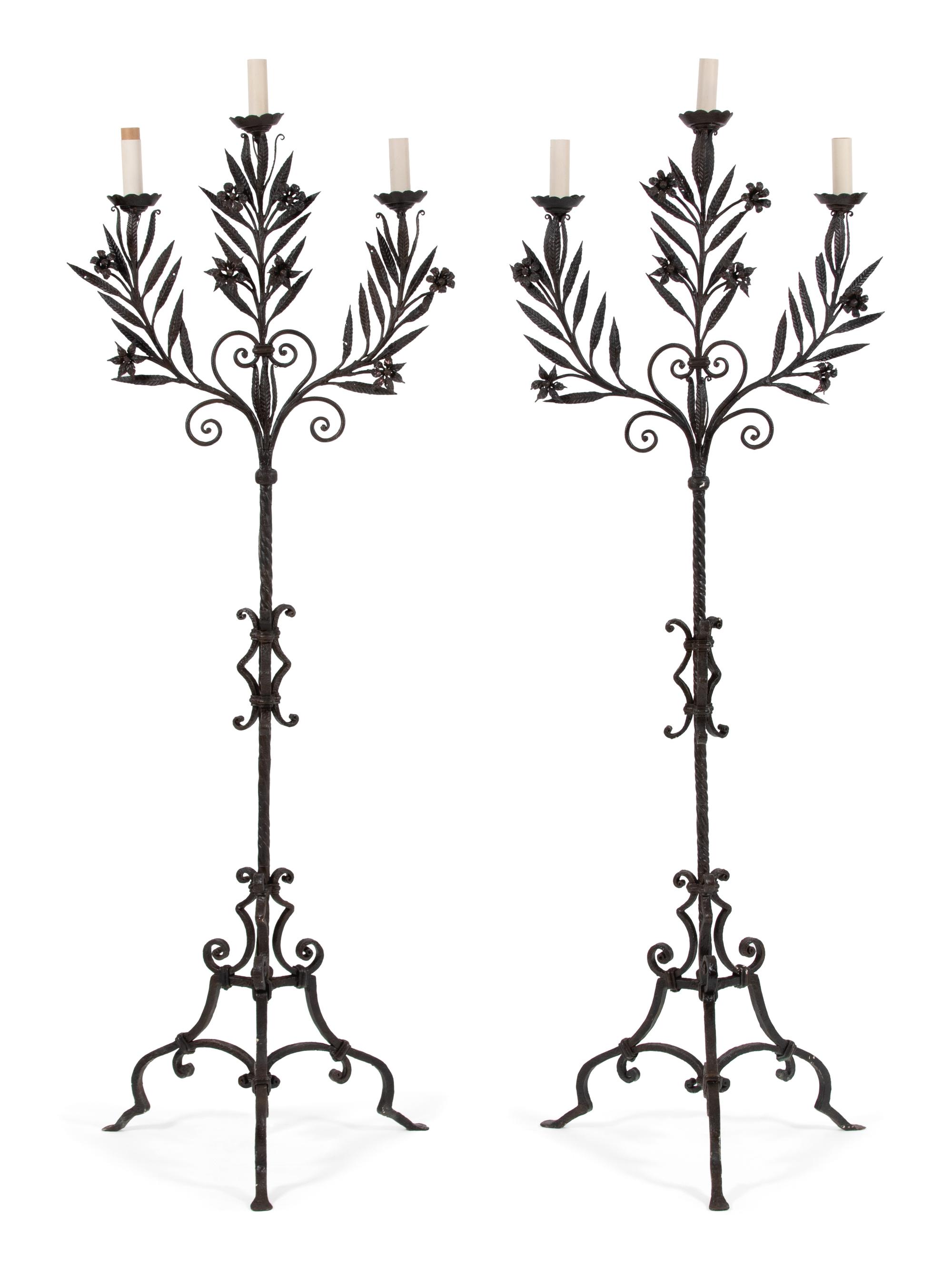 A Pair of Mizner Style Three-Light Wrought Iron Torcheres — FIRST QUARTER 20TH CENTURY