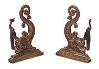 A Pair of Dolphin-Form Andirons and a Fender