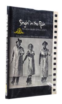 (COMDEN, BETTY AND ADOLPH GREEN) Singing in the Rain. New York, (1972). Inscribed by Comden and Green.