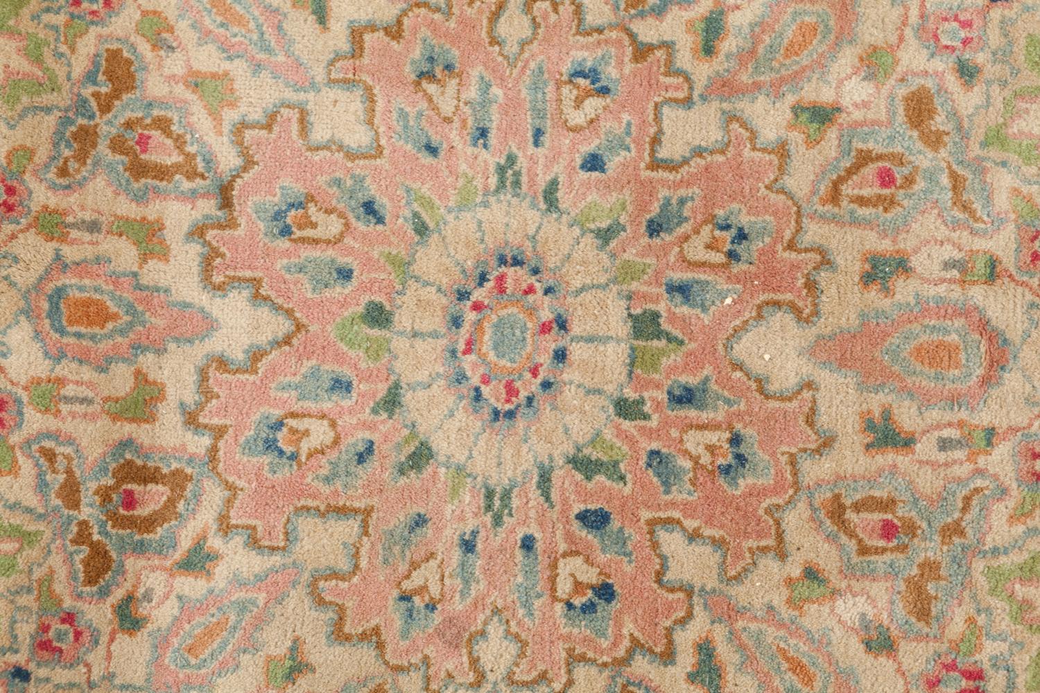A Kirman Wool Rug