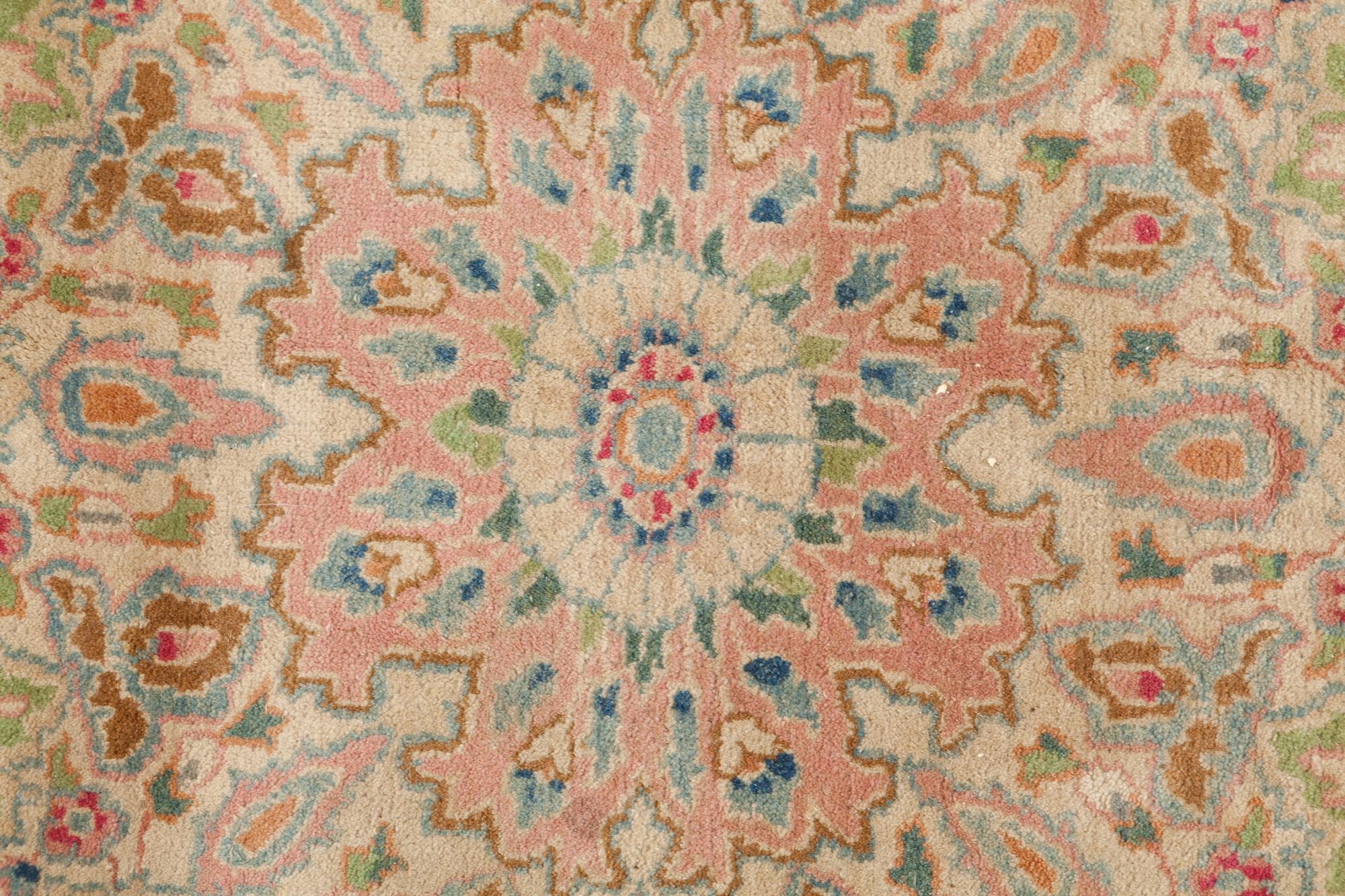 A Kirman Wool Rug