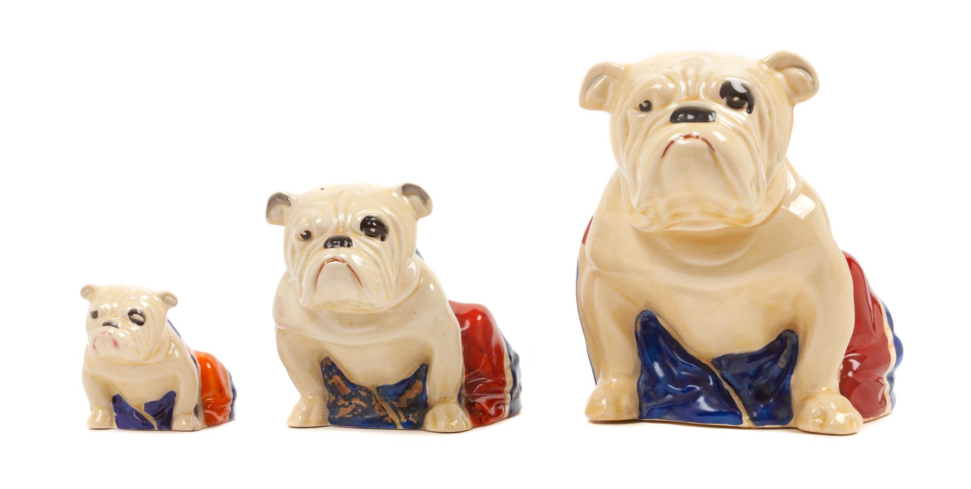 A Group of Three Royal Doulton Bulldogs Height of tallest 6 inches.