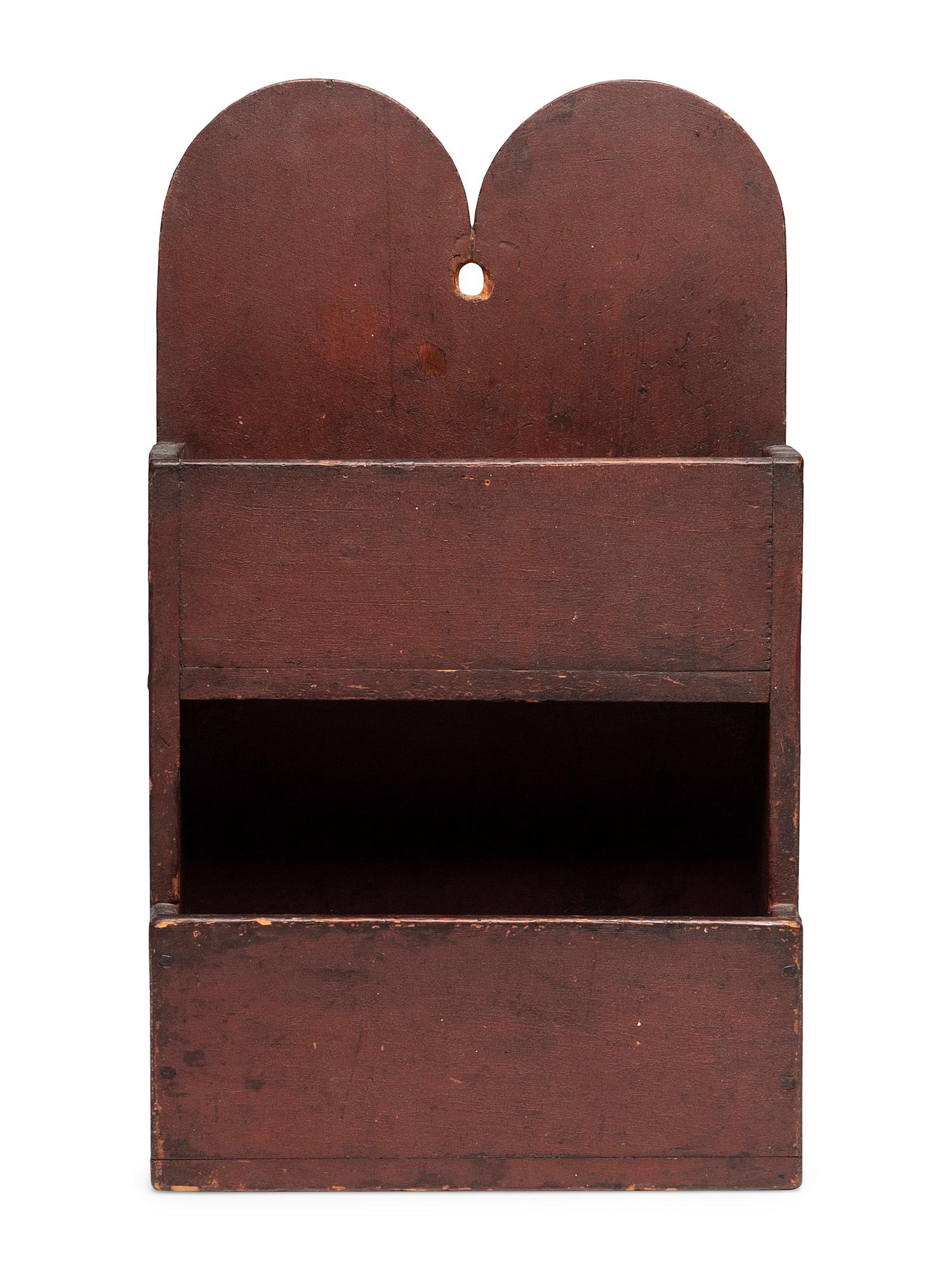 A Queen Anne Carved and Red Painted Pine Hanging Wall Box