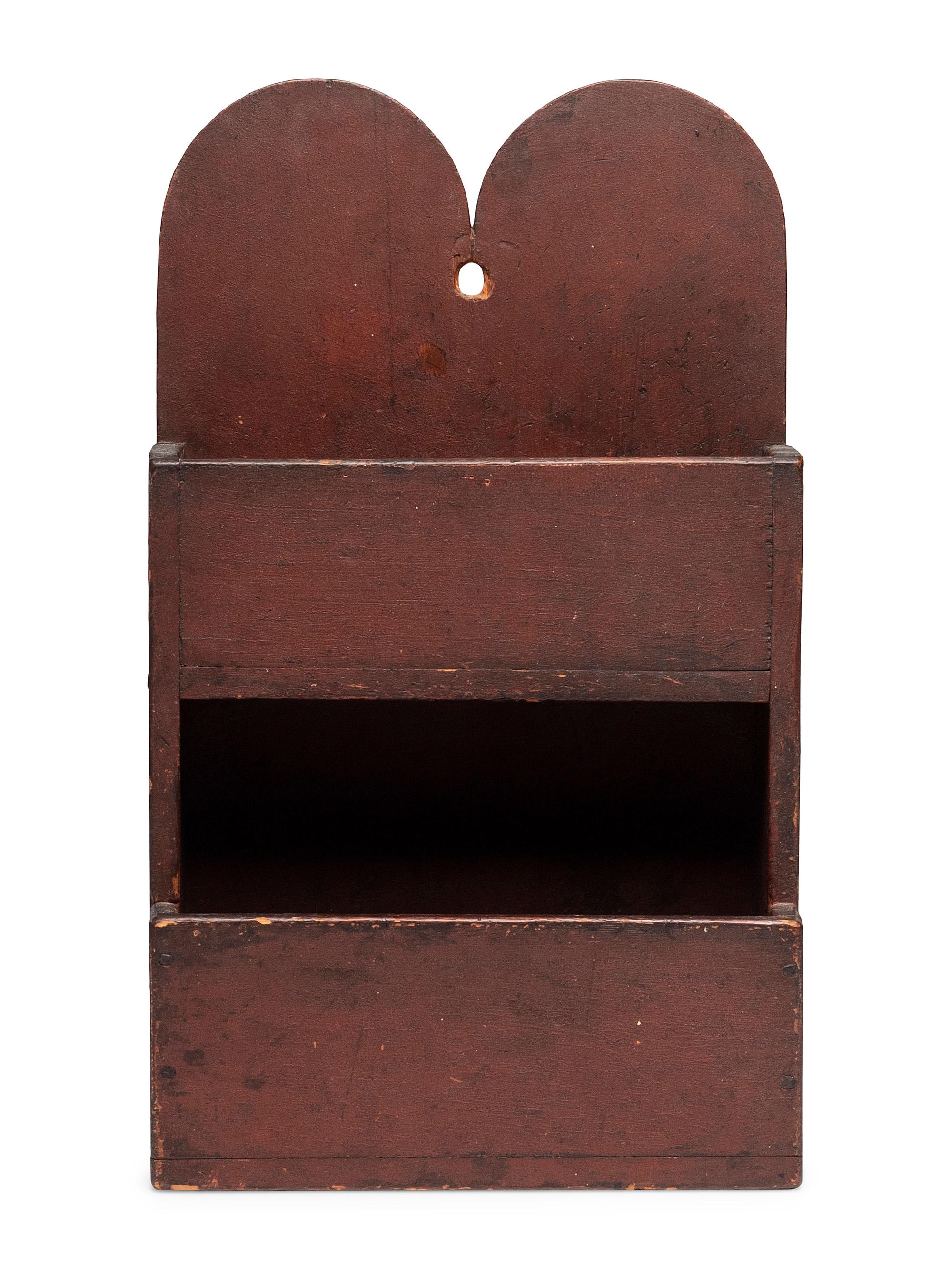 A Queen Anne Carved and Red Painted Pine Hanging Wall Box