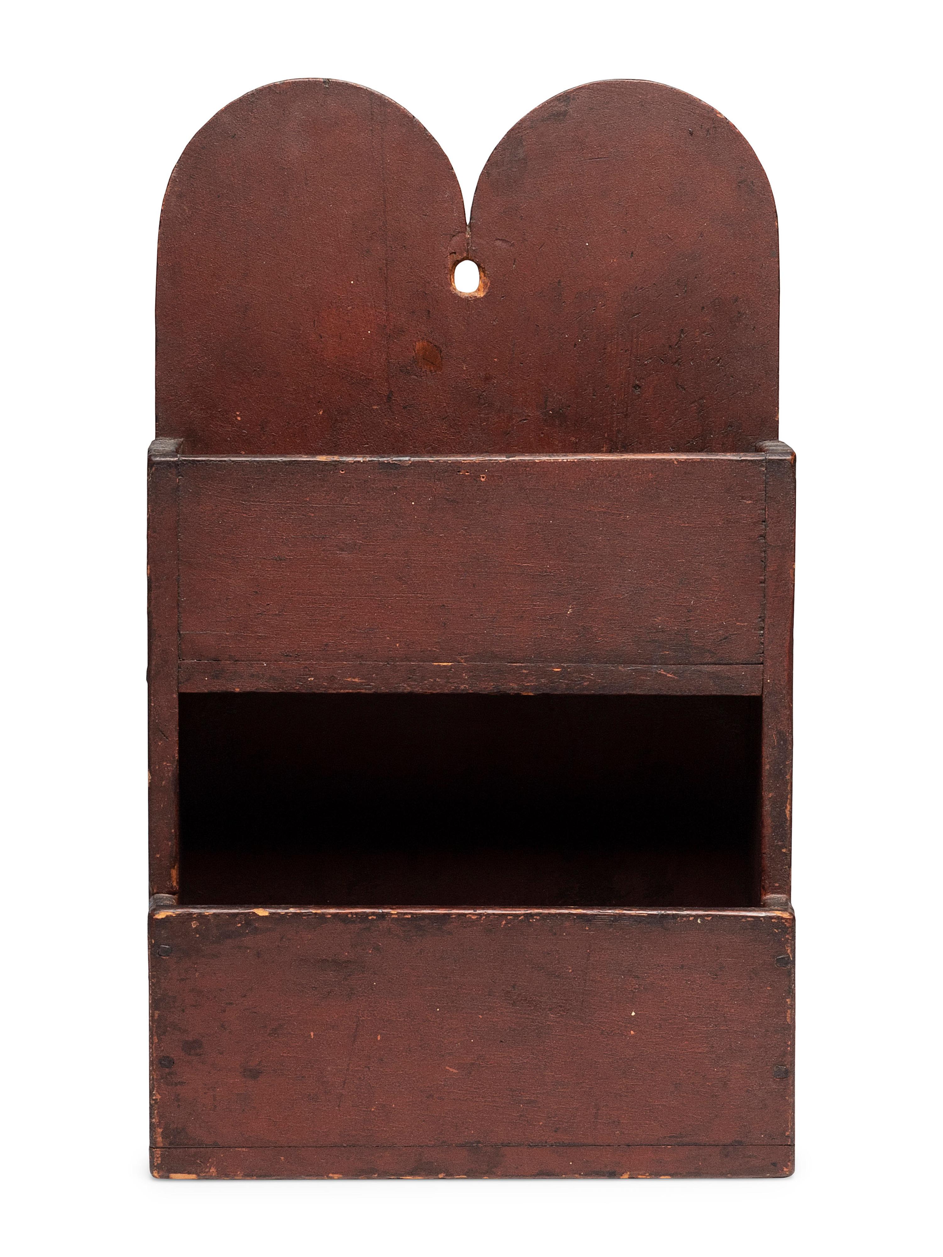 A Queen Anne Carved and Red Painted Pine Hanging Wall Box