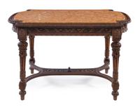 A Louis XVI Style Walnut Center Table Height 31 1/4 x width 51 x depth 32 1/4 inches. — LATE 19TH CENTURY