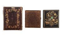 [EARLY PHOTOGRAPHY - PORTRAITURE]. A group of 7 daguerreotype and ambrotype portraits of men, many with interesting and unusual expressions and features, highlighted by full plate ambrotype of group of distinguished gents.