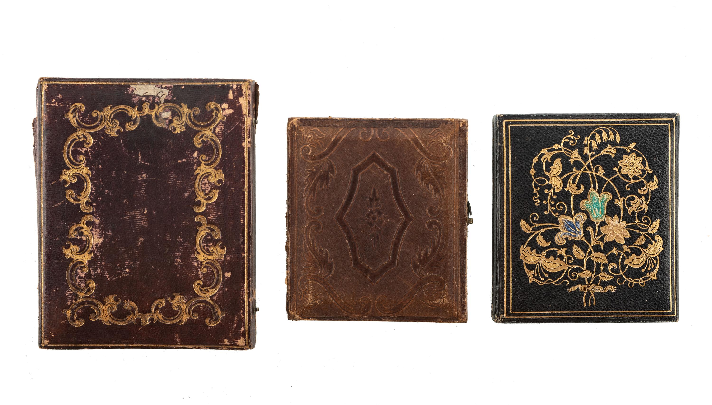 [EARLY PHOTOGRAPHY - PORTRAITURE]. A group of 7 daguerreotype and ambrotype portraits of men, many with interesting and unusual expressions and features, highlighted by full plate ambrotype of group of distinguished gents.