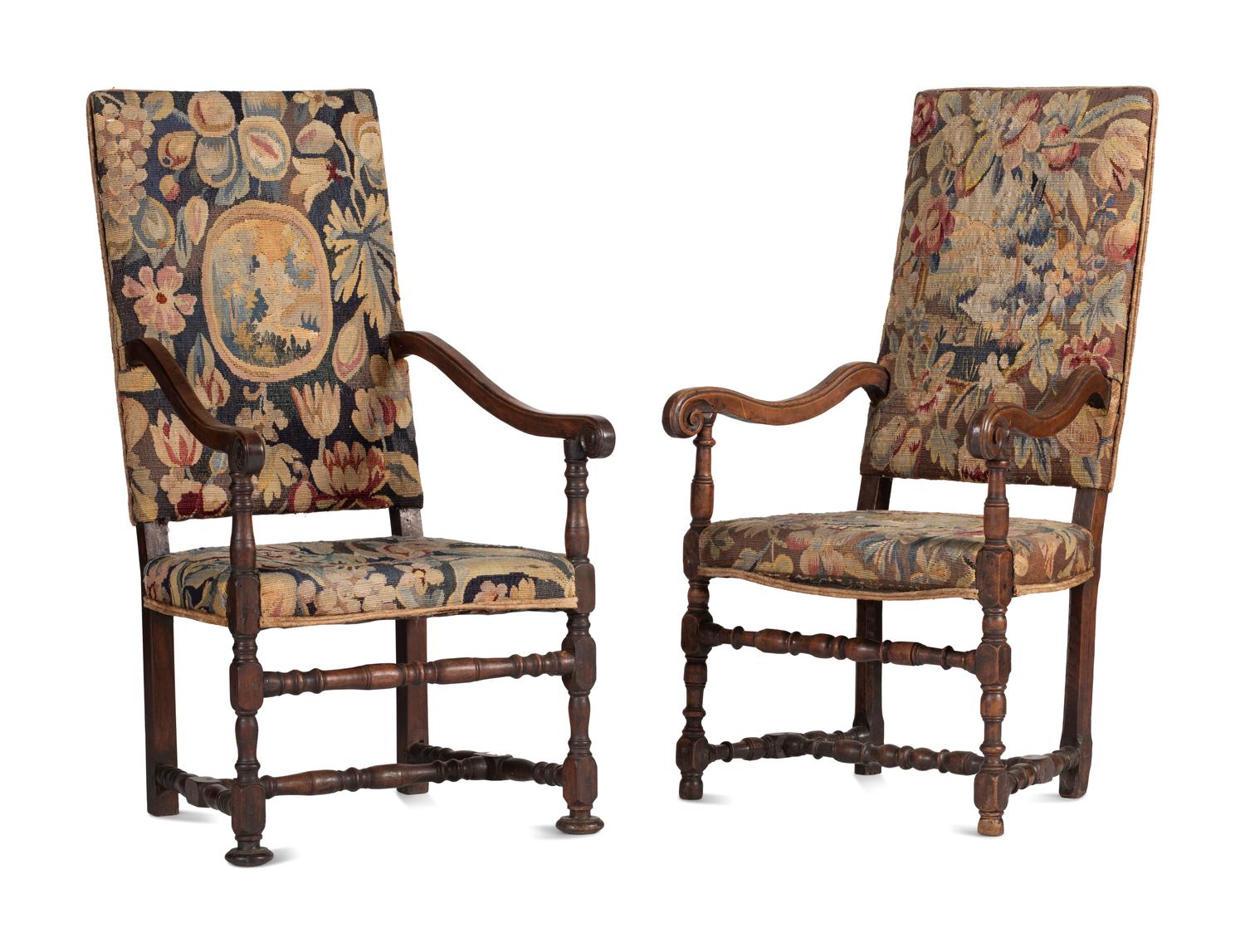 A Matched Pair of French Scroll-Carved and Turned Walnut Tapestry Upholstered Fauteuils