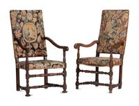 A Matched Pair of French Scroll-Carved and Turned Walnut Tapestry Upholstered Fauteuils