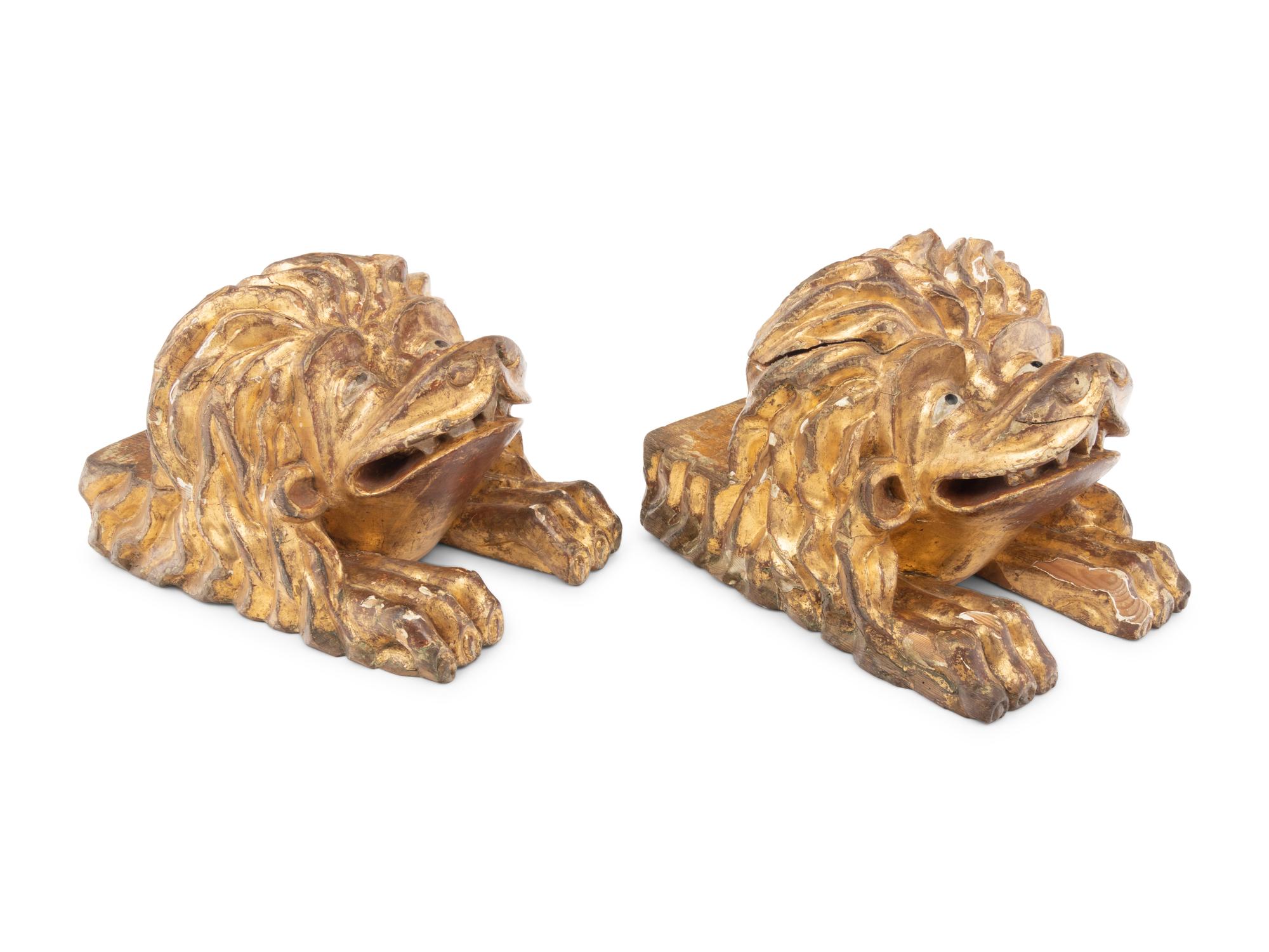 A Pair of Continental Carved Giltwood Lion Wall Brackets