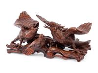 A Japanese Export Carved Rosewood Bird Group