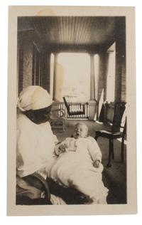 [EARLY PHOTOGRAPHY]. A pair of portraits of African American subjects holding white babies.