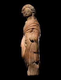 A Greek Terracotta Standing Draped Female
