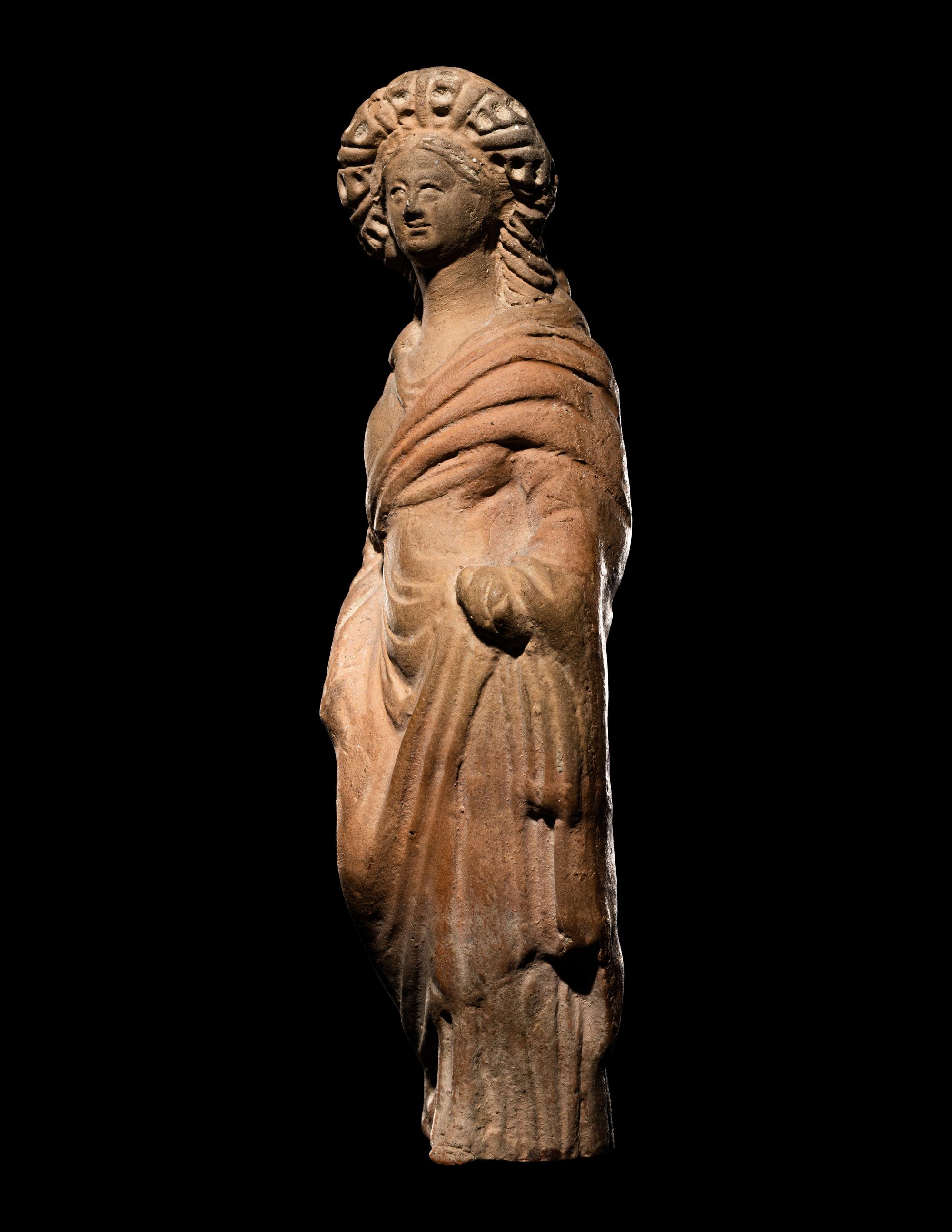 A Greek Terracotta Standing Draped Female