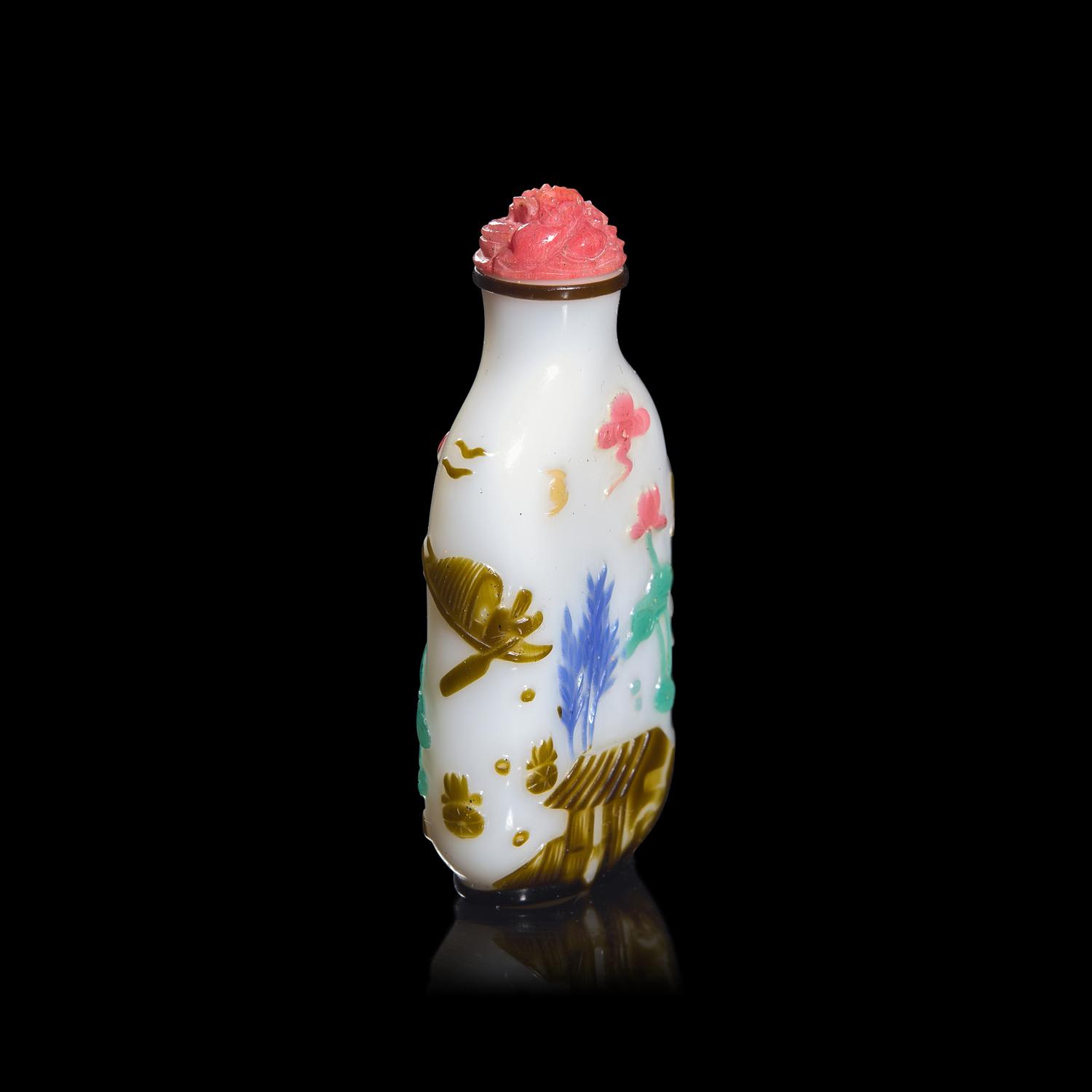 A Chinese Yangzhou Type Carved Multicolor Overlaid Glass Snuff Bottle