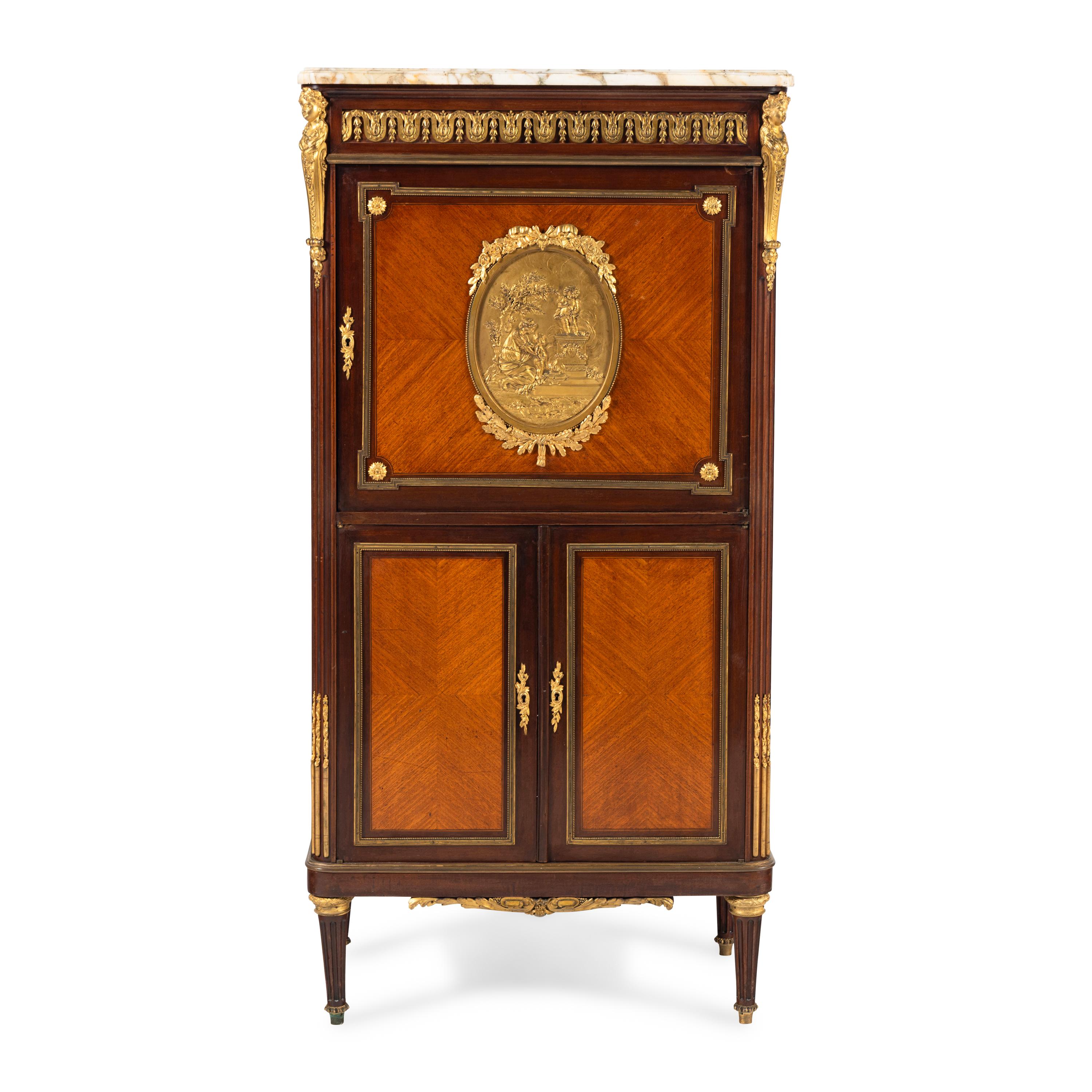 A Louis XV Style Gilt Bronze Mounted Mahogany and Tulipwood Marble-Top Cabinet