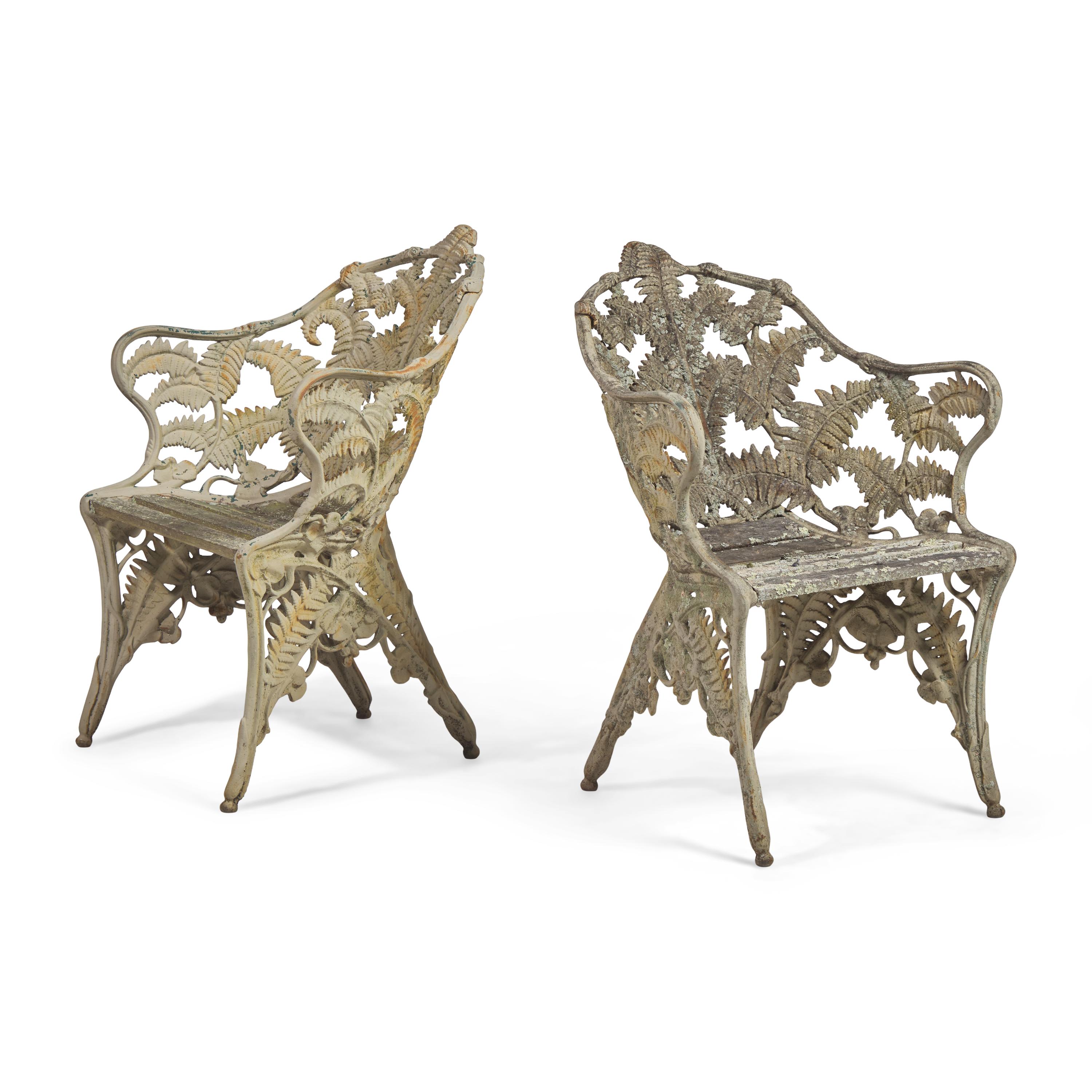 A Pair of Cast Iron Fern Pattern Garden Armchairs