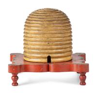A Fraternal Carved and Painted Wood Beehive
