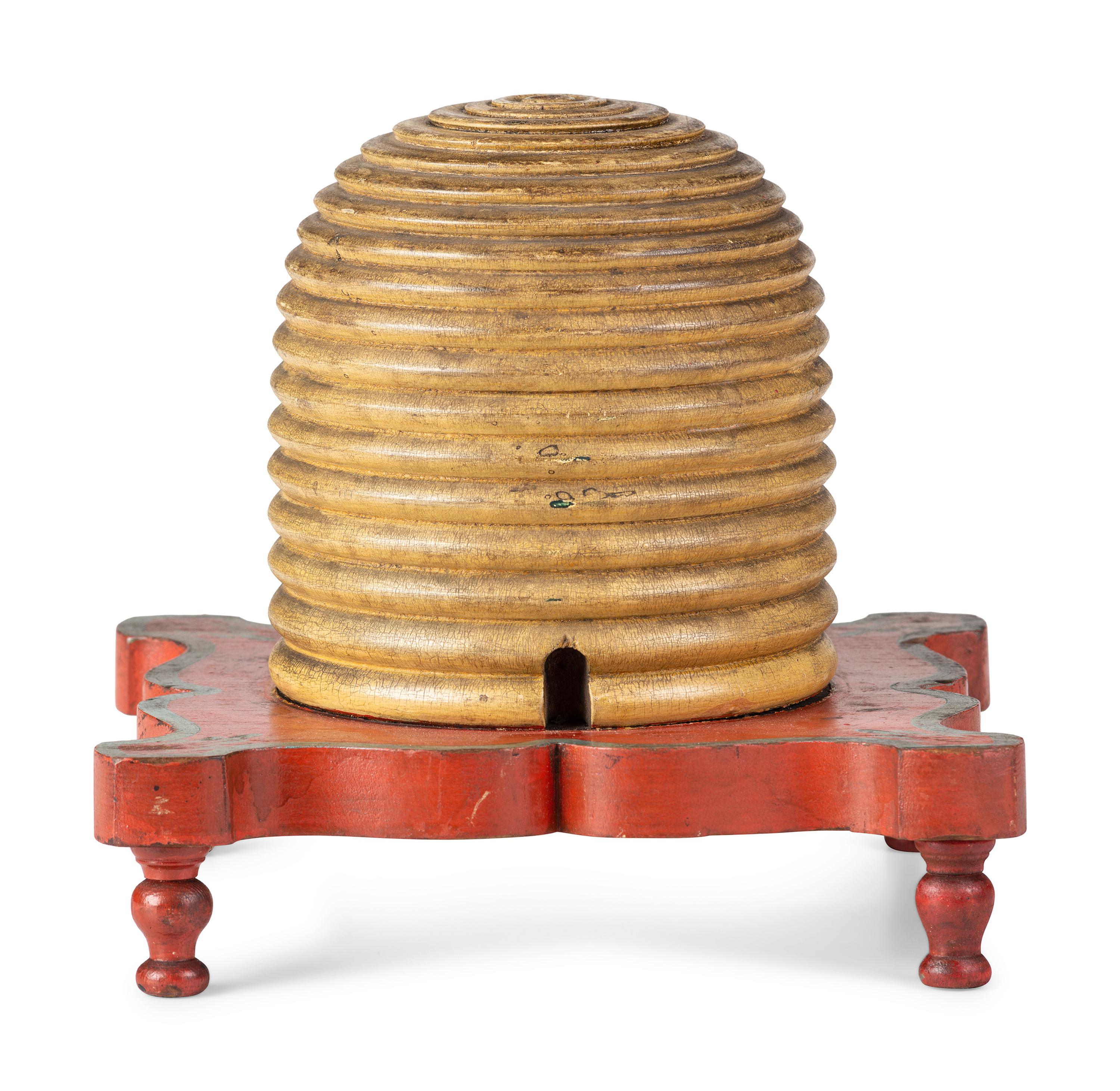A Fraternal Carved and Painted Wood Beehive