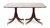 A Sheraton Style Mahogany Dining Table Height 28 1/2 x length 72 1/2 x depth 47 1/2 inches.