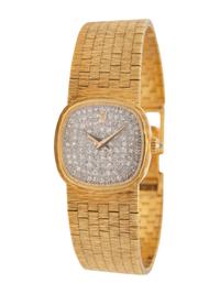 CORUM, 18K YELLOW GOLD AND DIAMOND WATCH