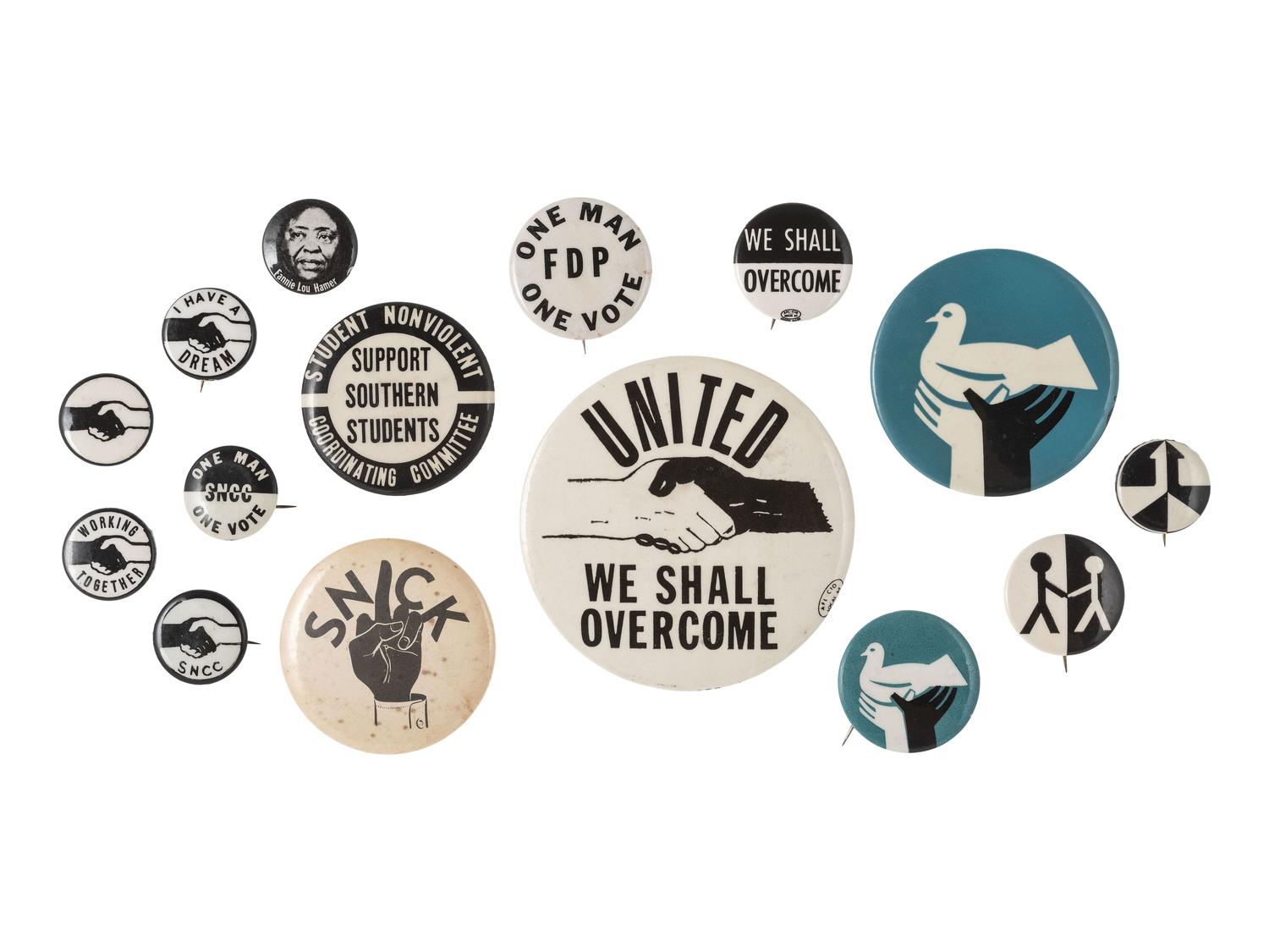 [STUDENT NONVIOLENT COORDINATING COMMITTEE]. A group of 15 pinback buttons related to SNCC and other Civil Rights organizations.