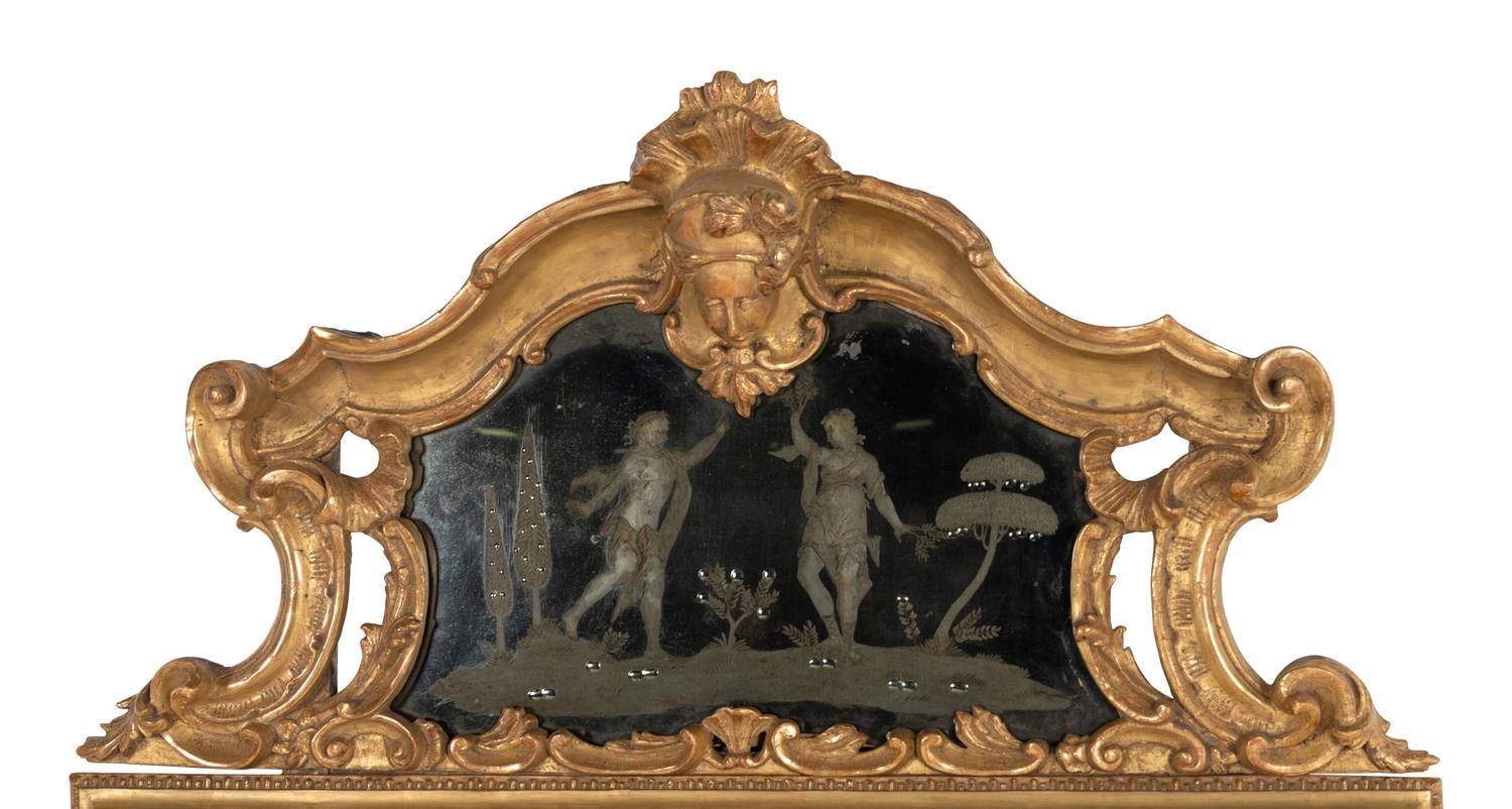 An Italian Rococo Giltwood and Etched Glass Mirror