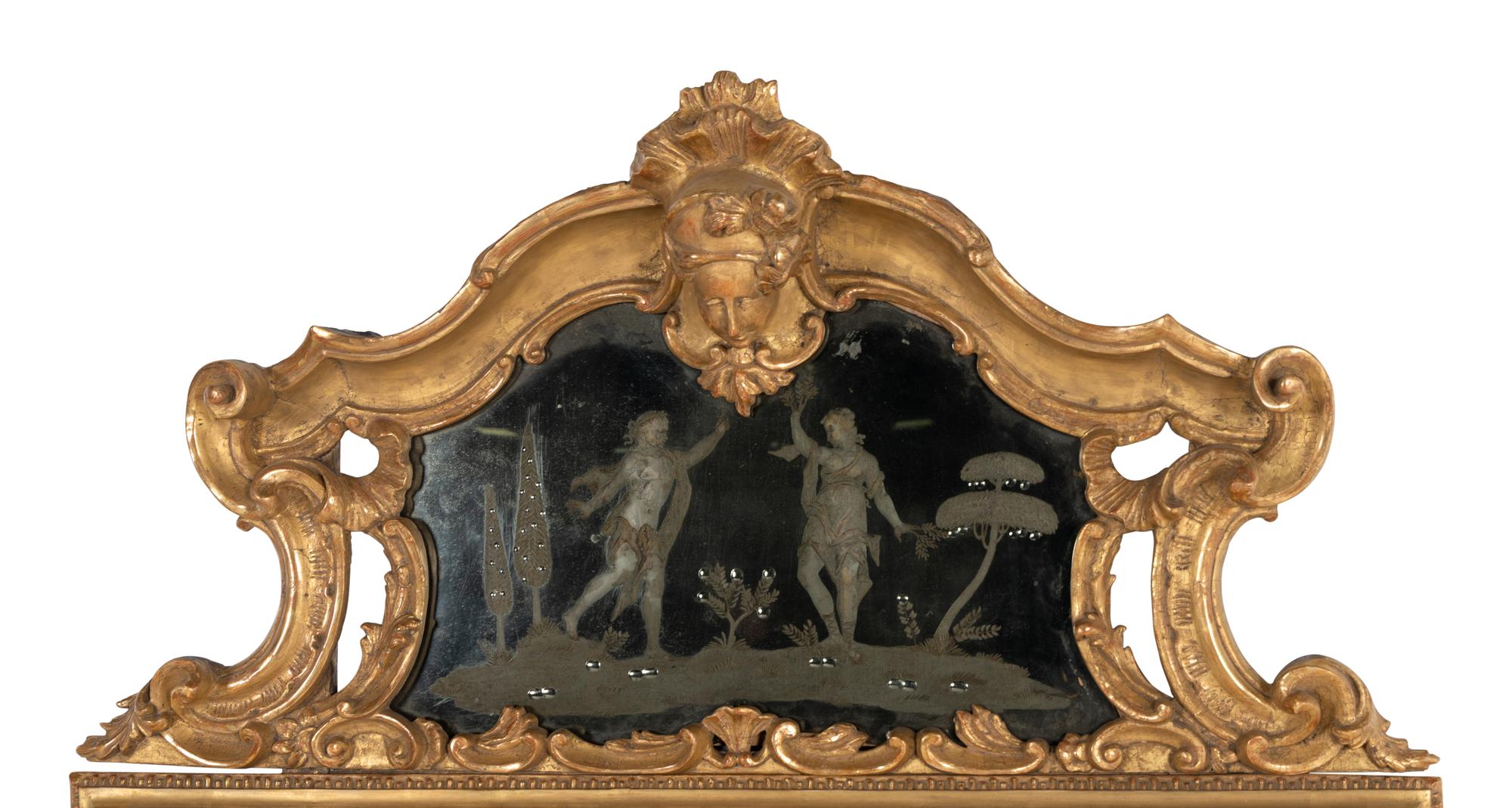 An Italian Rococo Giltwood and Etched Glass Mirror