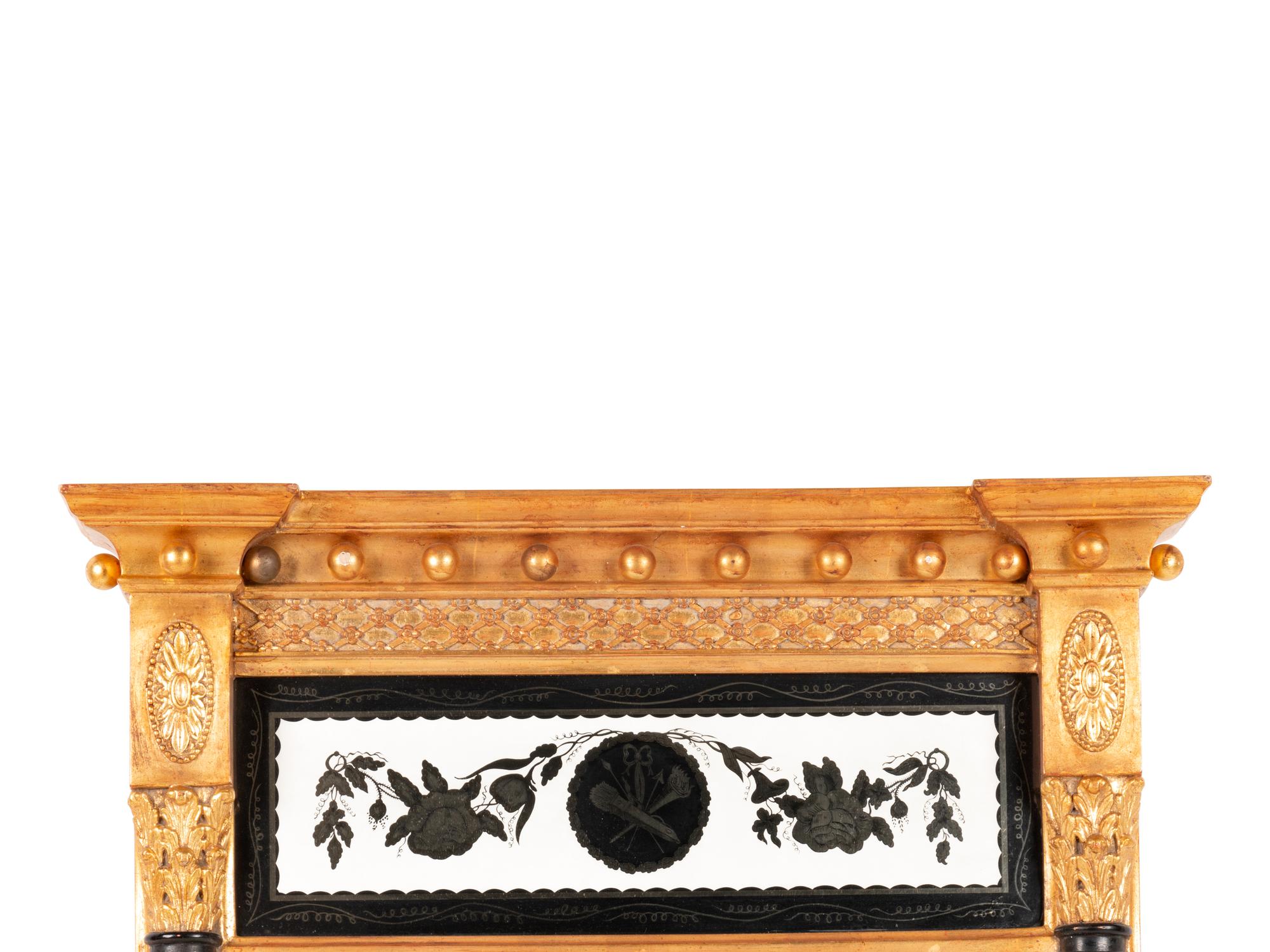 A Federal Style Giltwood and Églomisé Mirror