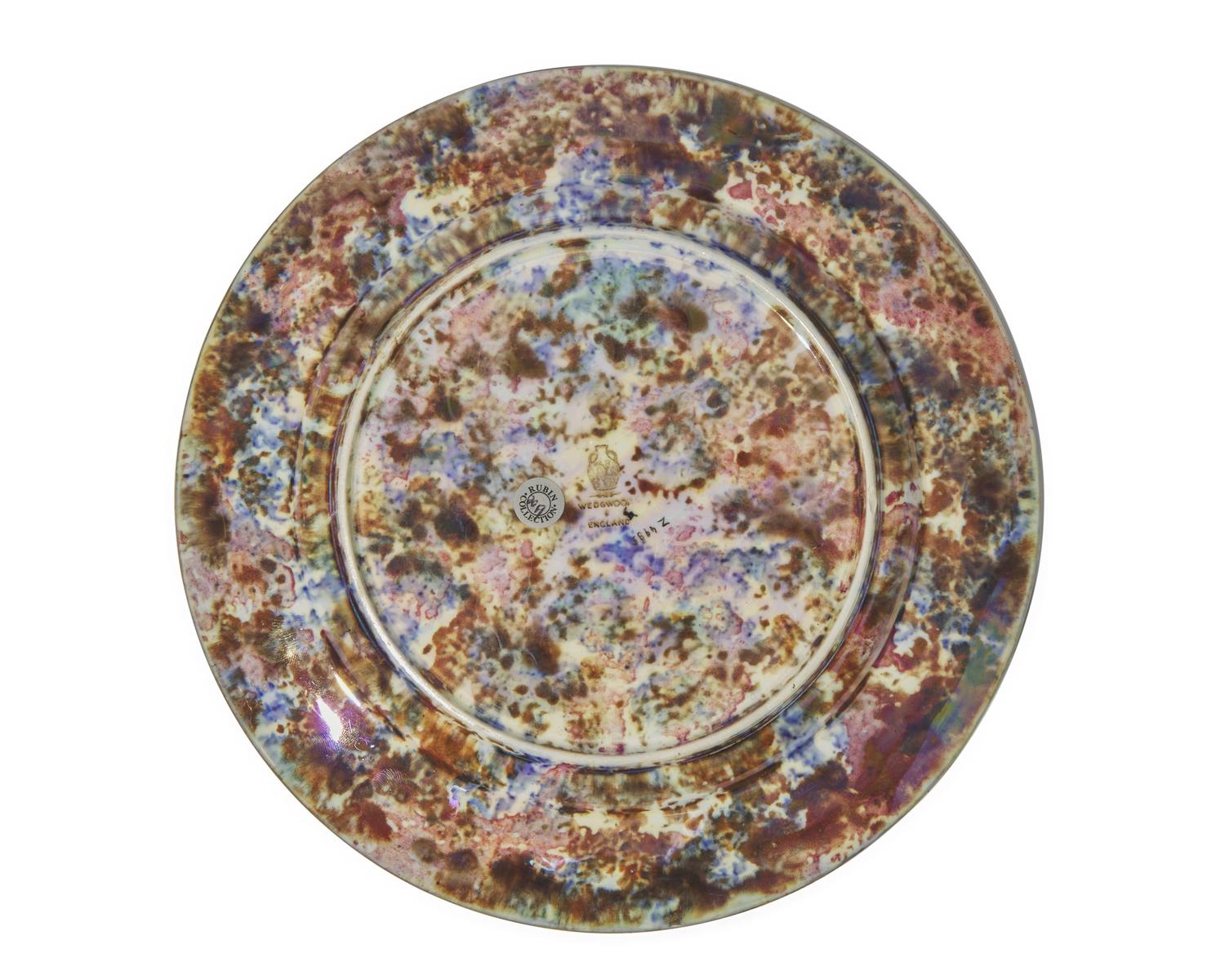 A Set of Four Wedgwood Lustreware Plates