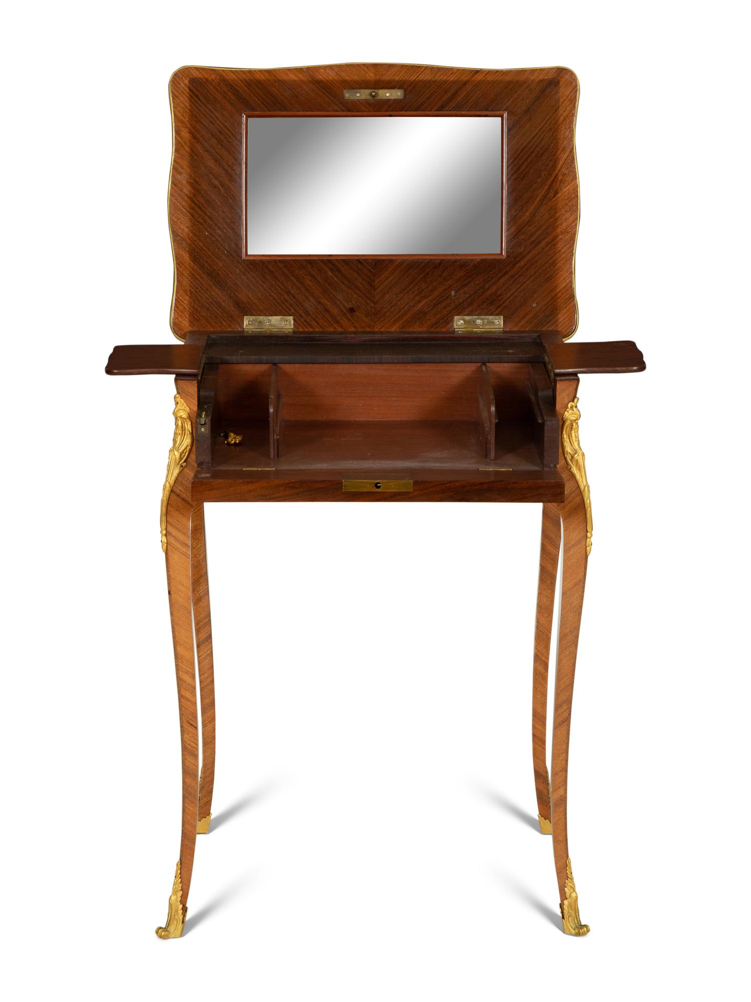 A Louis XV Style Gilt Metal Mounted Parquetry Dressing Table