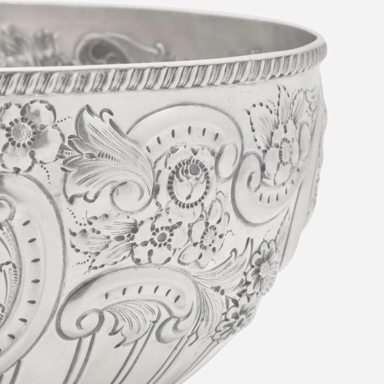 A Victorian sterling silver repoussé punch bowl William Hutton & Sons Ltd., London, 1899
