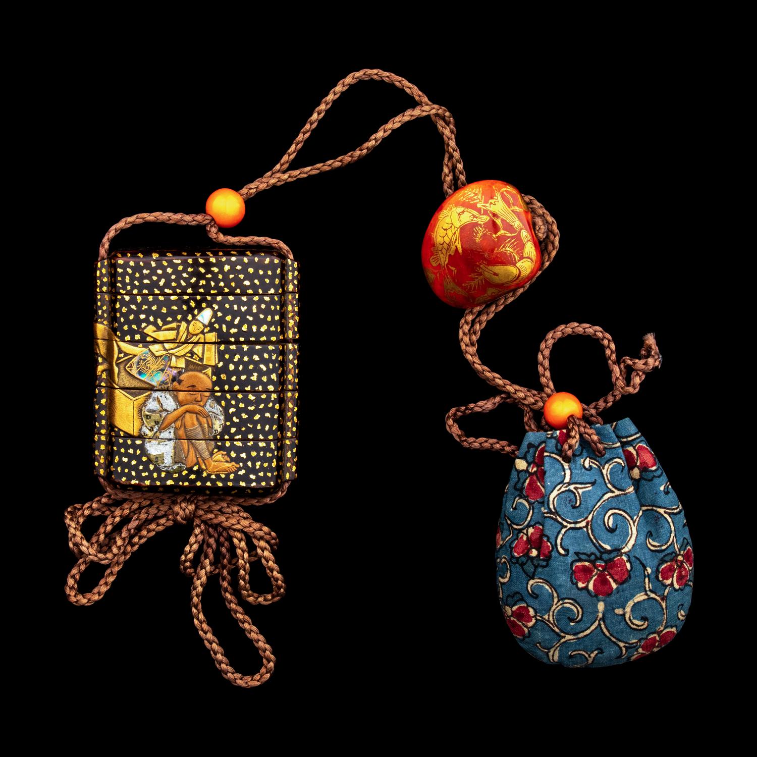 A Japanese Gold and Black Lacquer Four-Case Inro