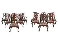 A Set of Twelve Continental Walnut Dining Chairs