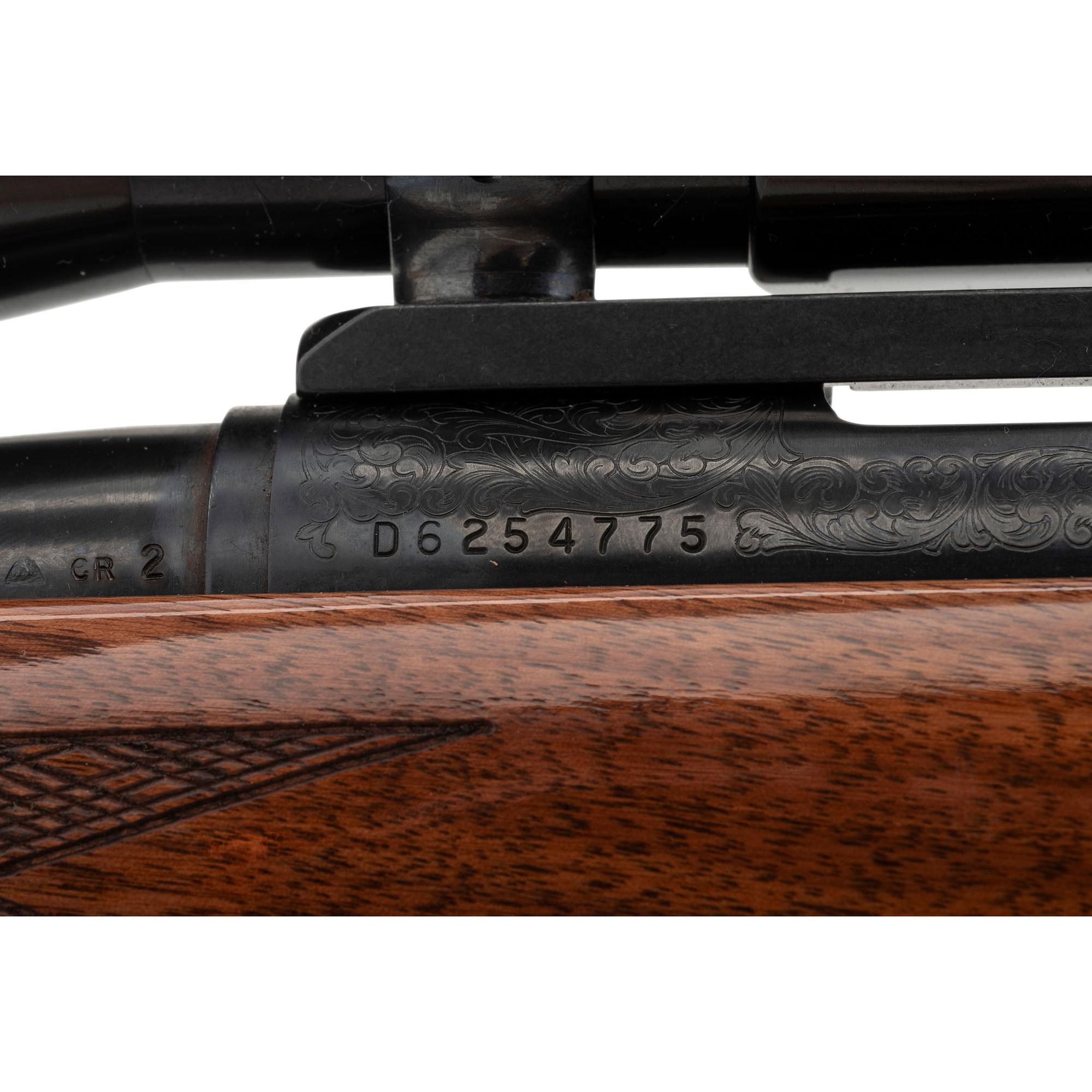 * Remington Model 700 Rifle with Burris Scope and Engraved Receiver